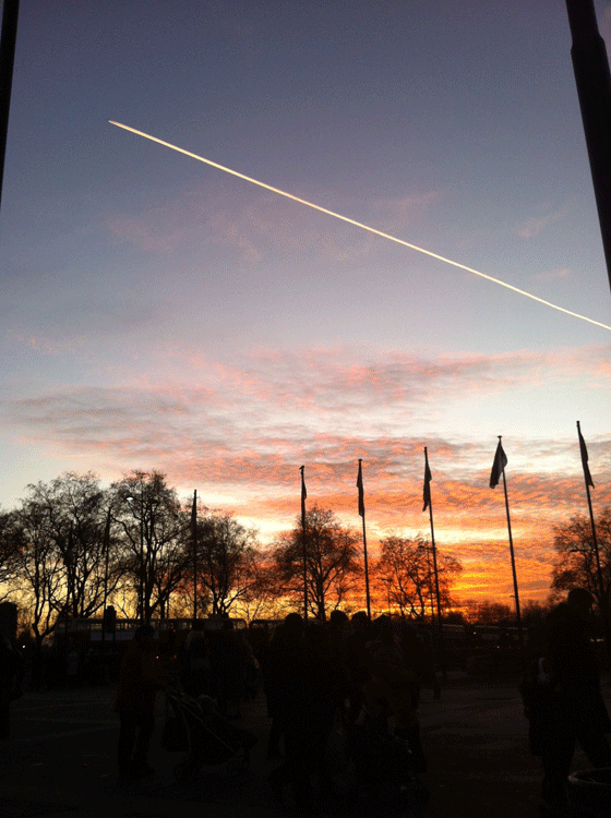 sunset with contrail