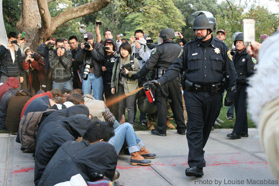 Lt John Pike casually pepper-sprays peaceful protesters