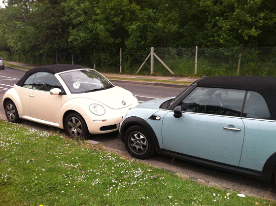 two Volkswagen Beetles